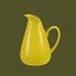 A chartreuse colored pitcher.  
