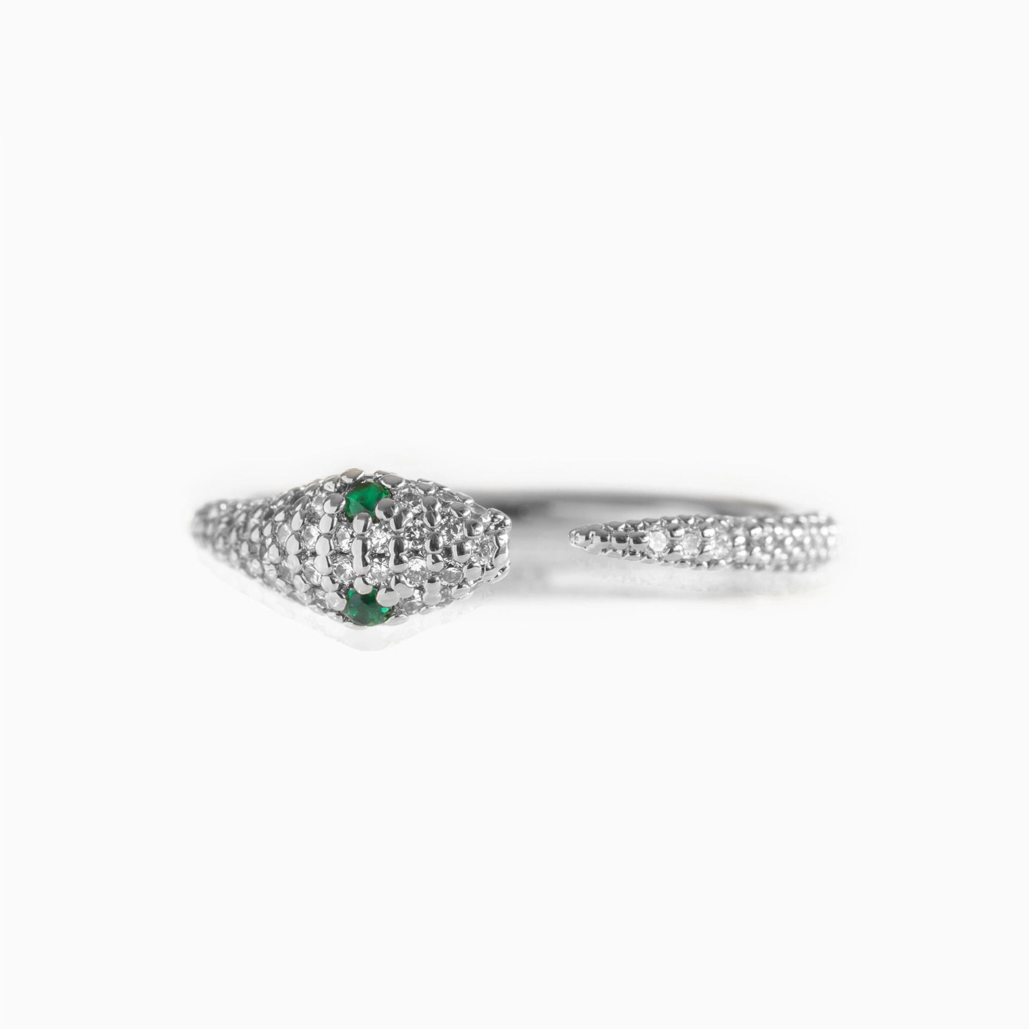A silver snake design ring with green cz stones for eyes.