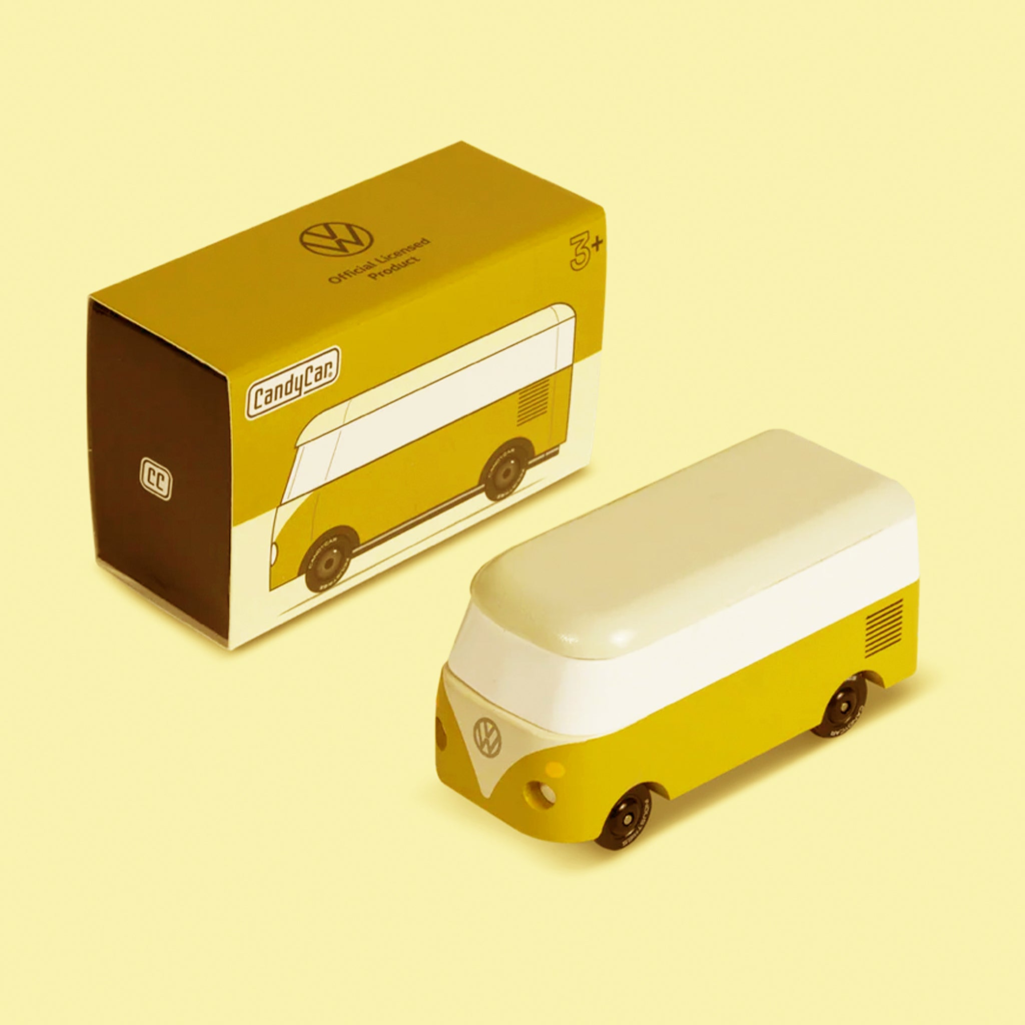 An olive green VW bus mini wooden toy. 