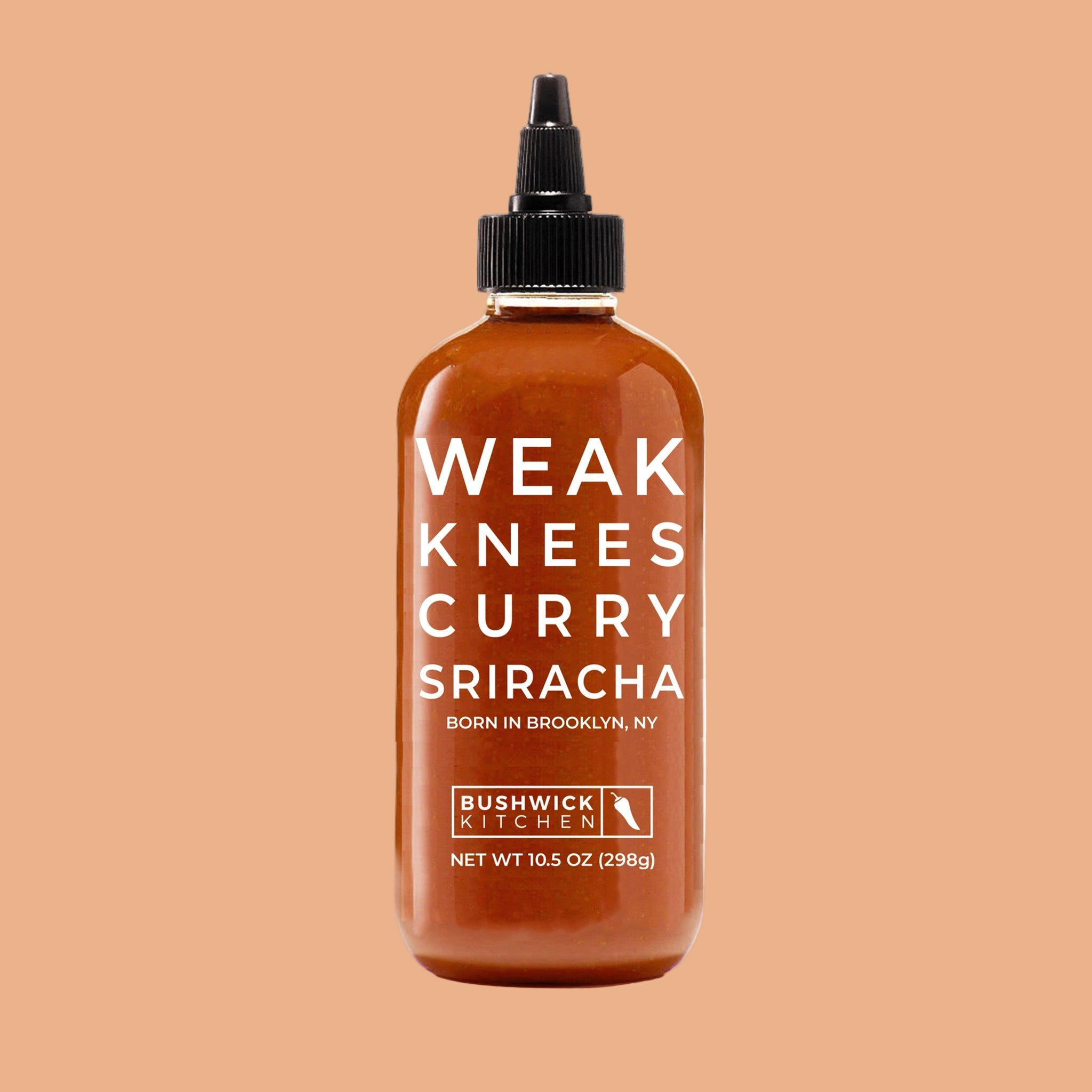 A bottle of sriracha with text that reads, 'Weak Knees Curry Sriracha'. 