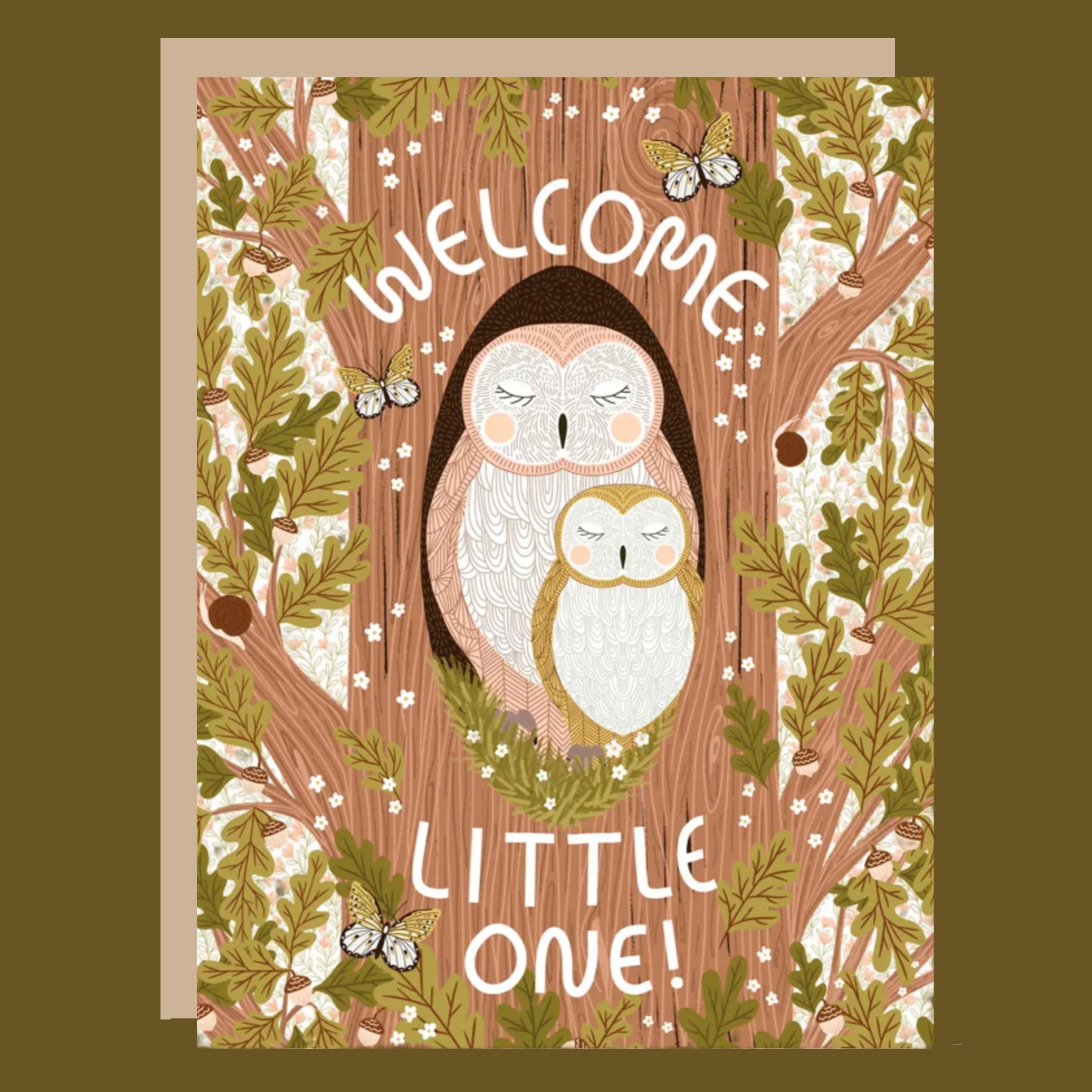 Greeting card with owls in a tree and 'Welcome Little One!' text on a brown background