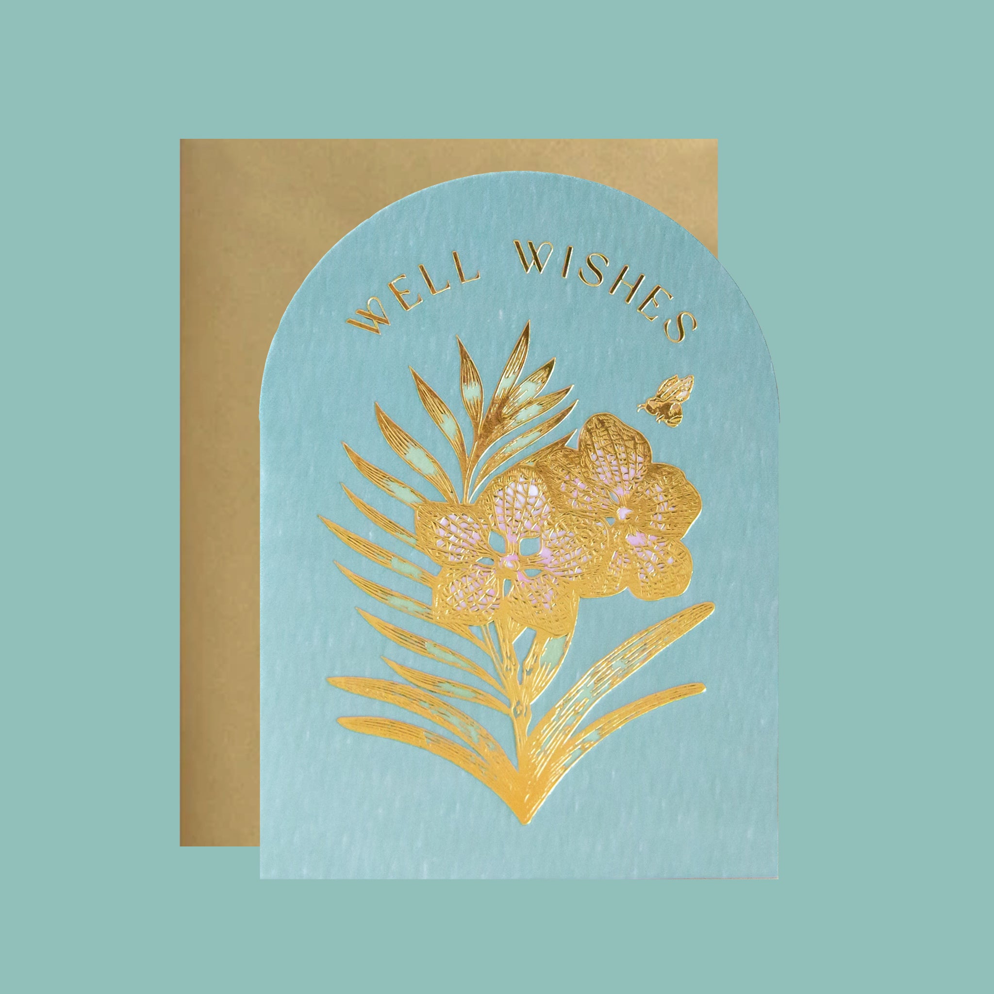 Greeting card with gold floral design and 'Well Wishes' text on a light blue background