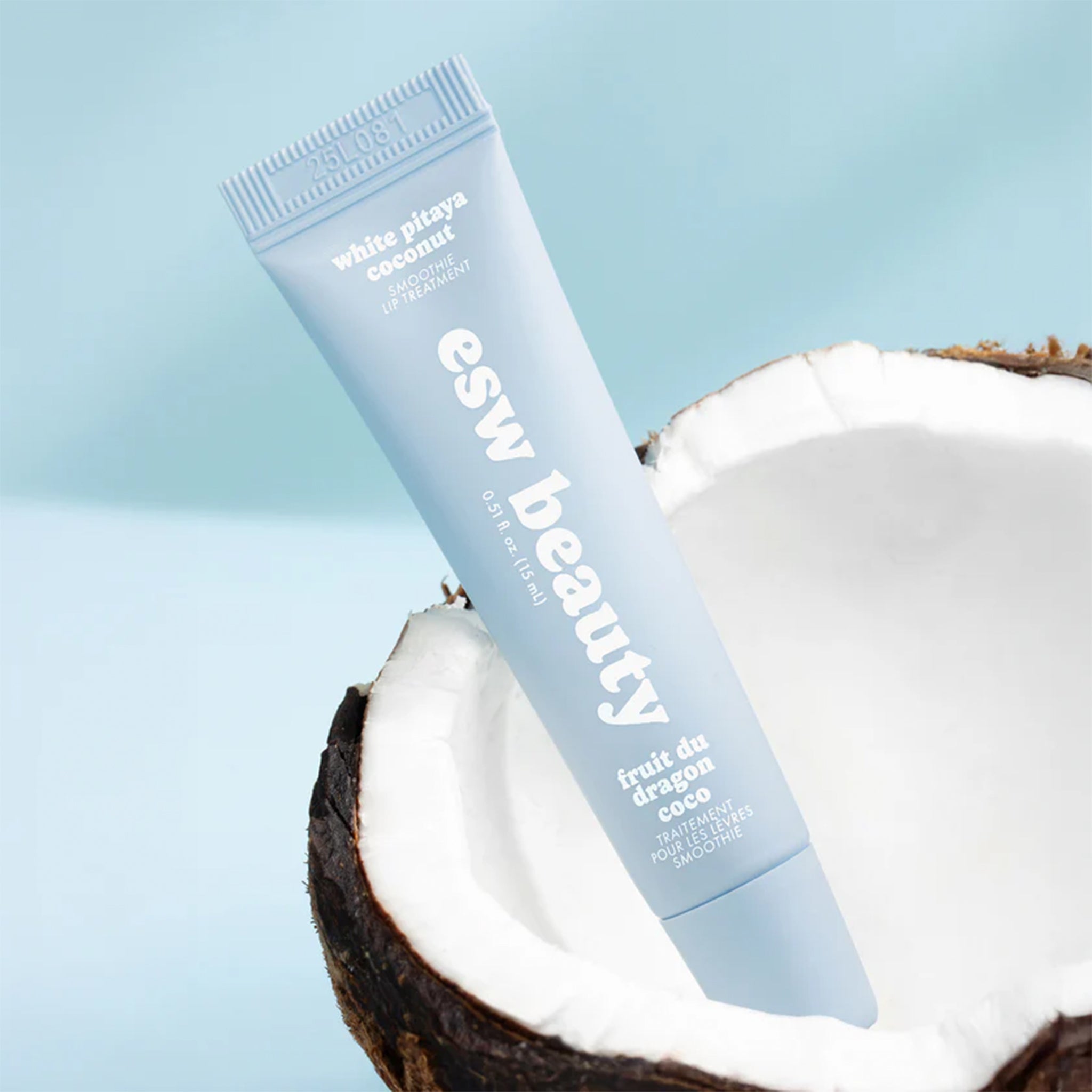 A white tube of lip butter with text that reads, 'White Pitaya Coconut Smoothie'