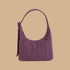 A purple nylon mini handbag.