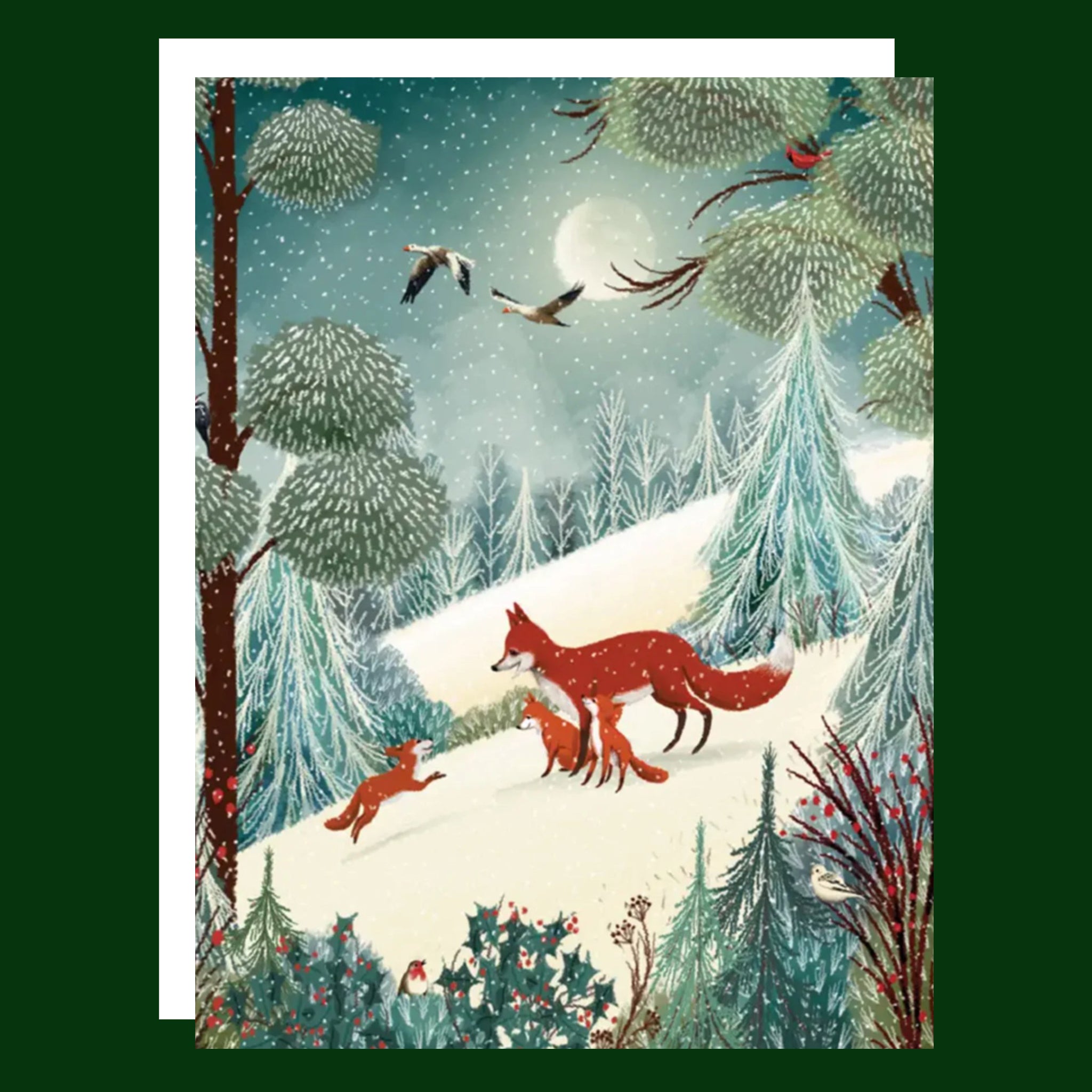 A woodland illustration on a greeting card featuring a family of foxes. 