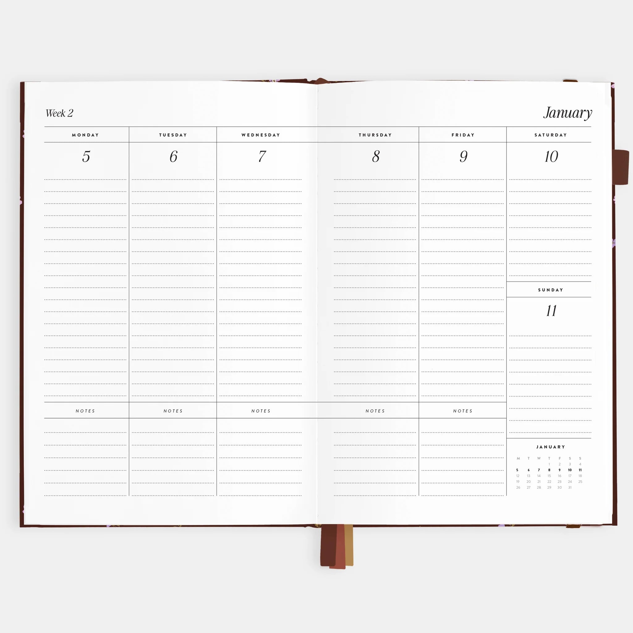 The inside of the planner with a weekly view and lines for tasks and notes. 