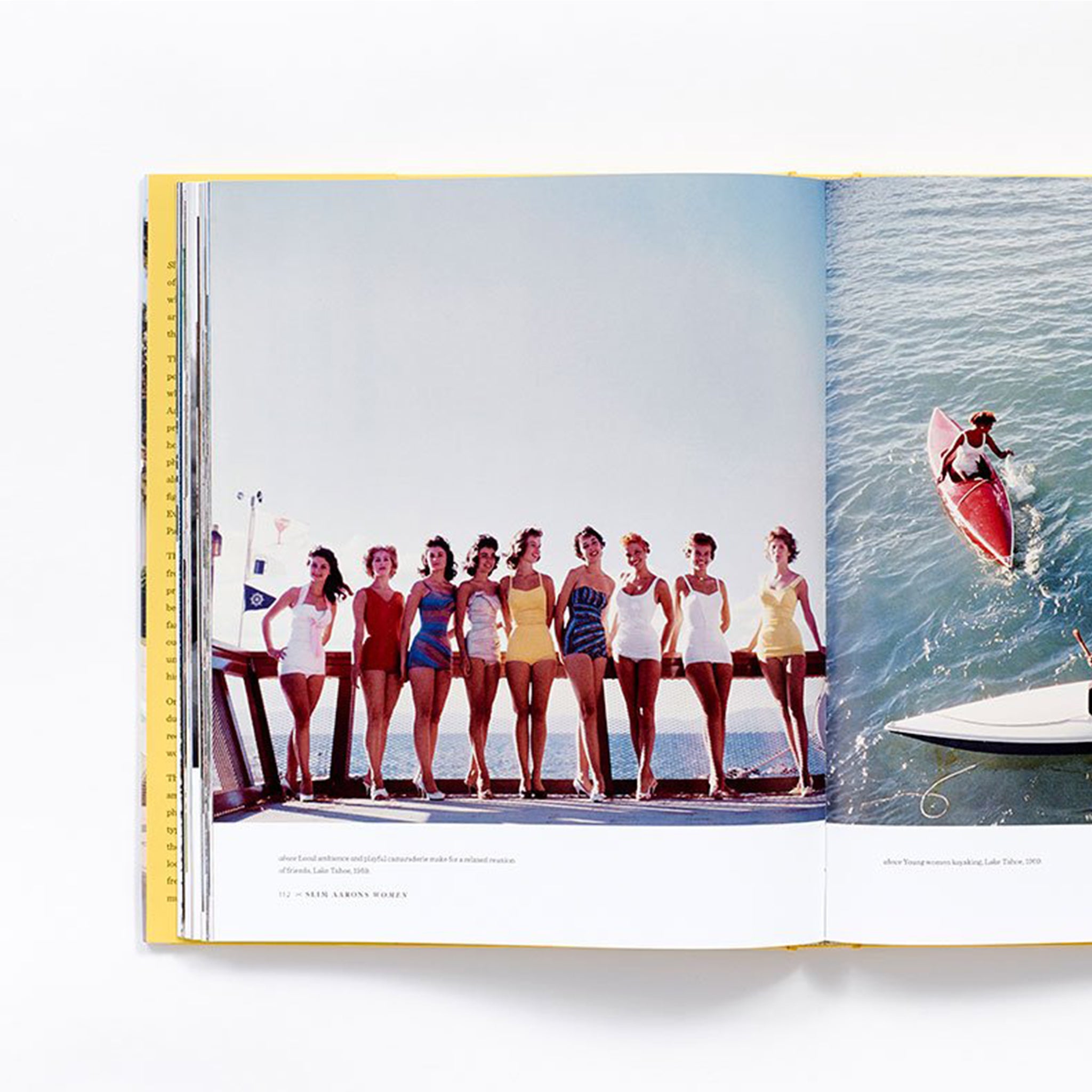 The book open to show the photographs of iconic women inside.