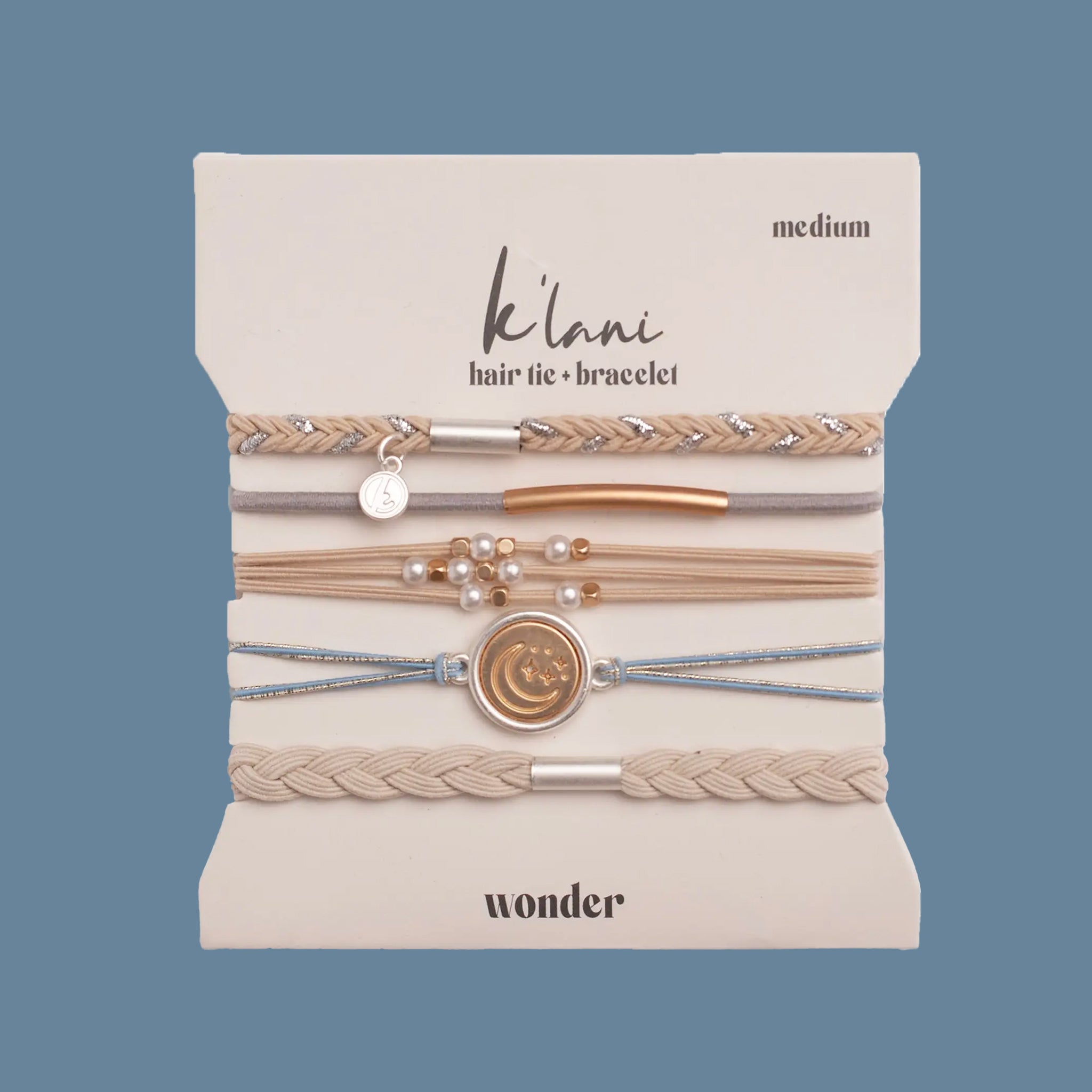 Collection of hair ties with decorative elements on a light background