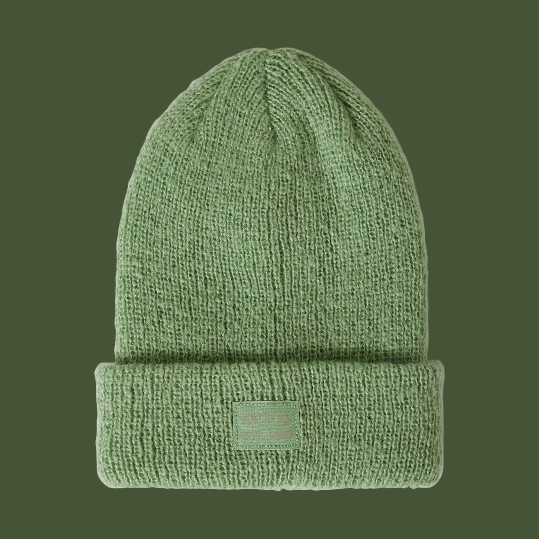 A green knit beanie. 