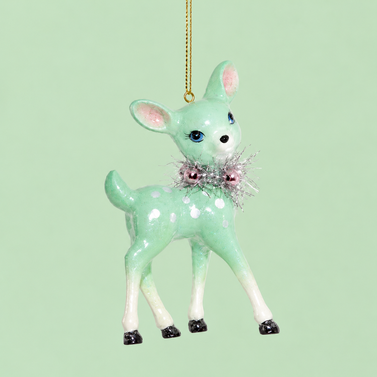 a mint green deer ornament.