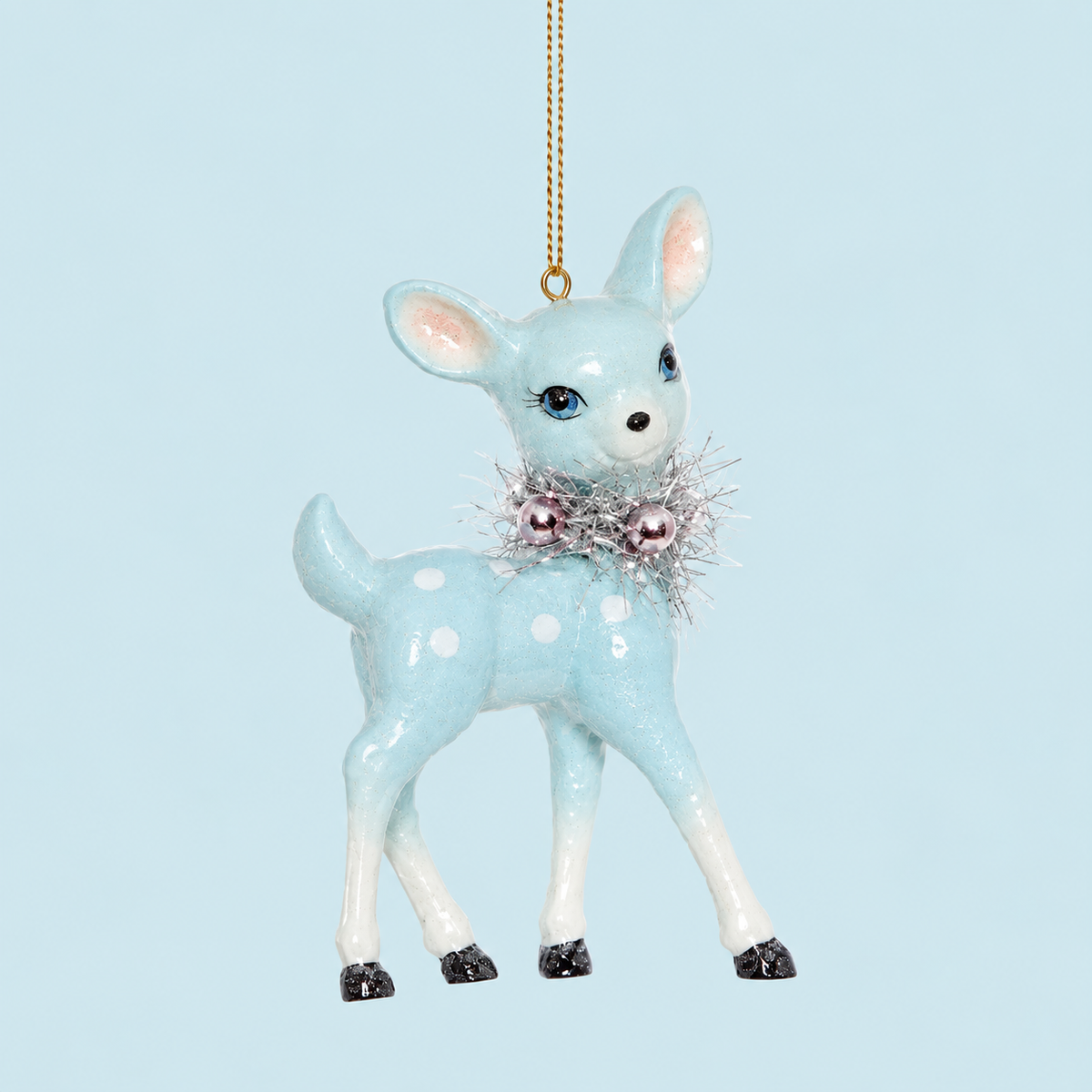 a light blue retro deer ornament. 