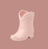 A ceramic boot shaped pink candle. 