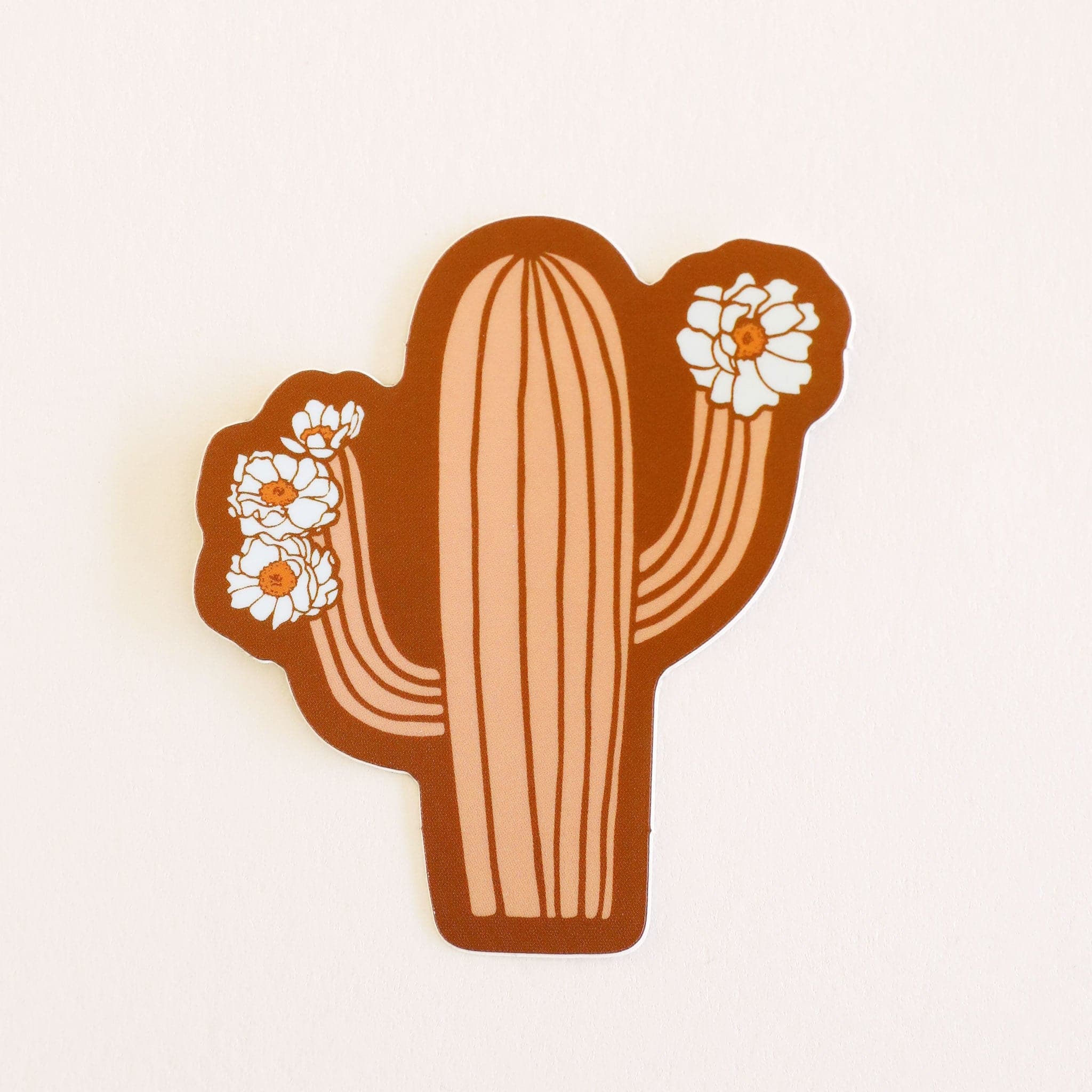 A salmon pink cactus sticker with cactus flowers on each arm.