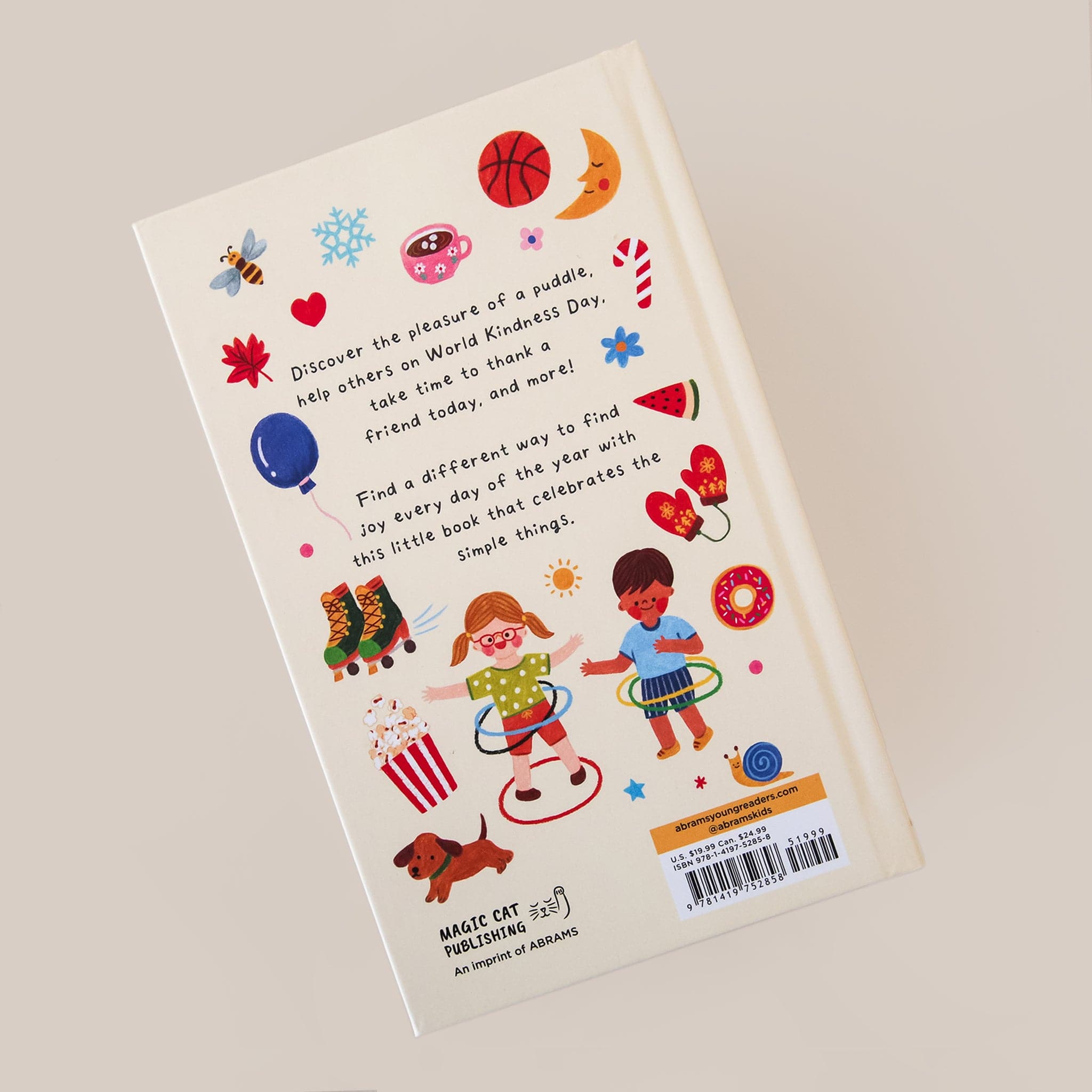 The back of the book that features more colorful illustrations. There is a bee, roller-skates, a balloon, a piece of watermelon, mittens, a cup of hot chocolate, a basketball, the moon, a candy cane, a snowflake, and a donut. Also pictured are two children playing with hula hoops. There is text in the center that reads, &quot;Find a different way to find joy in every day of the year with this little book that celebrates the simple things.&quot;.