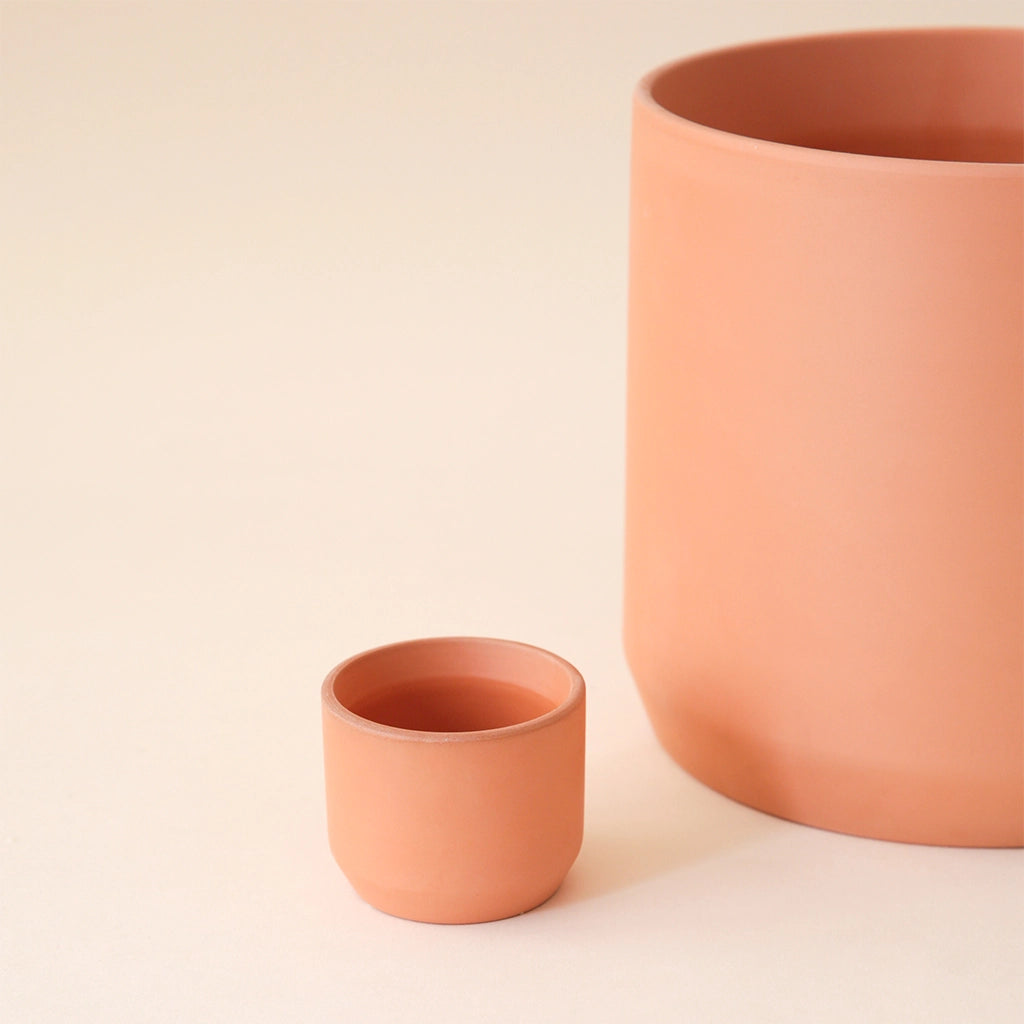 Terracotta pots with a slant edge at the bottom.