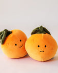 Adorable, plush oranges with sweet smiles and speckled cheeks. With floppy green leaves, these oranges are the absolute cutest. Their fur is soft and their leaves are floppy.