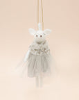 A white felt unicorn ornament with a grey tulle dress.