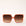 70's inspired square sunglasses with an oversized cognac colored frame and a brown lens.