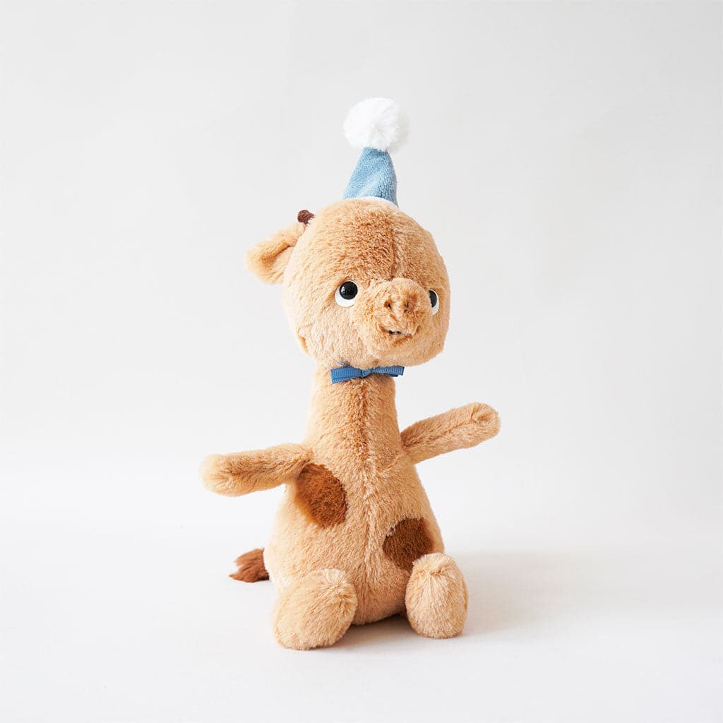Tan, plush stuffed giraffe with hazel spots across his belly, wearing the sweetest baby blue party hat.