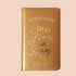 High quality, honey toned memory book reading 'Newlywed's one line a day; a three year memory book' in silver foil lettering across the padded cover. 
