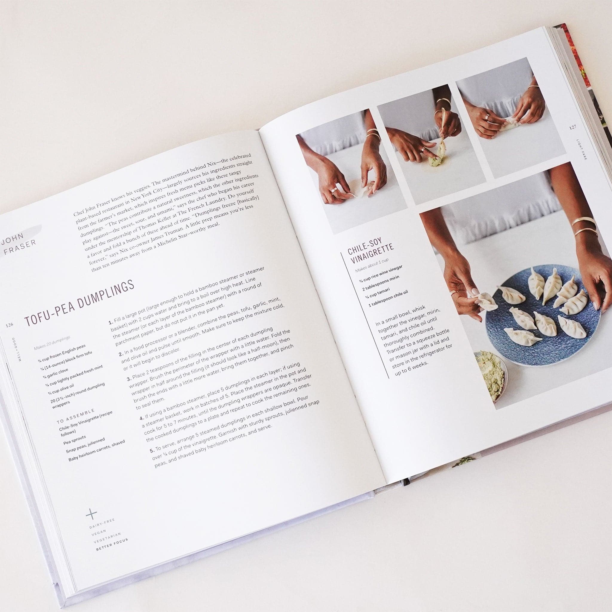 Cookbook open to two pages. To the left is instructions on how to make tofu-pea dumplings and to the right are step by step images to assist with the recipe. 