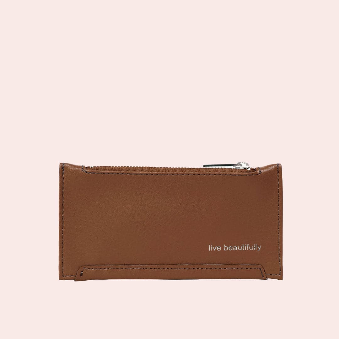 A slim, brown, card holder with a zipper pocket along the top to secure coins, cash or other small things you may need to store.