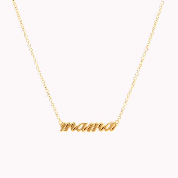 Photo of a gold necklace on a white background. Necklace reads "mama" in gold lowercase script. Chain is linked to either side of the word at the top-most point and the chain is leading upwards off the page in a "v" shape. 