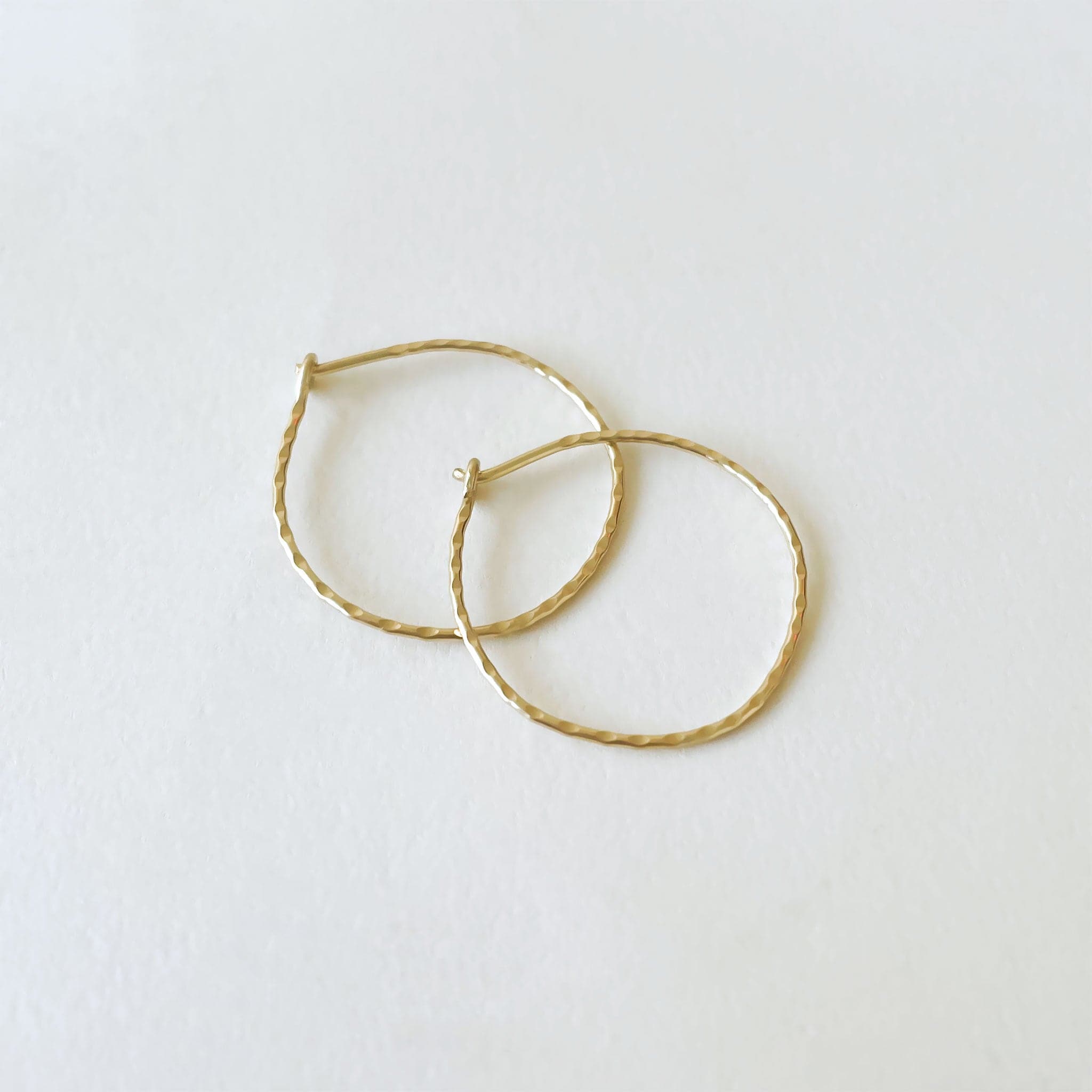The medium size of the hammered 14k hoops.