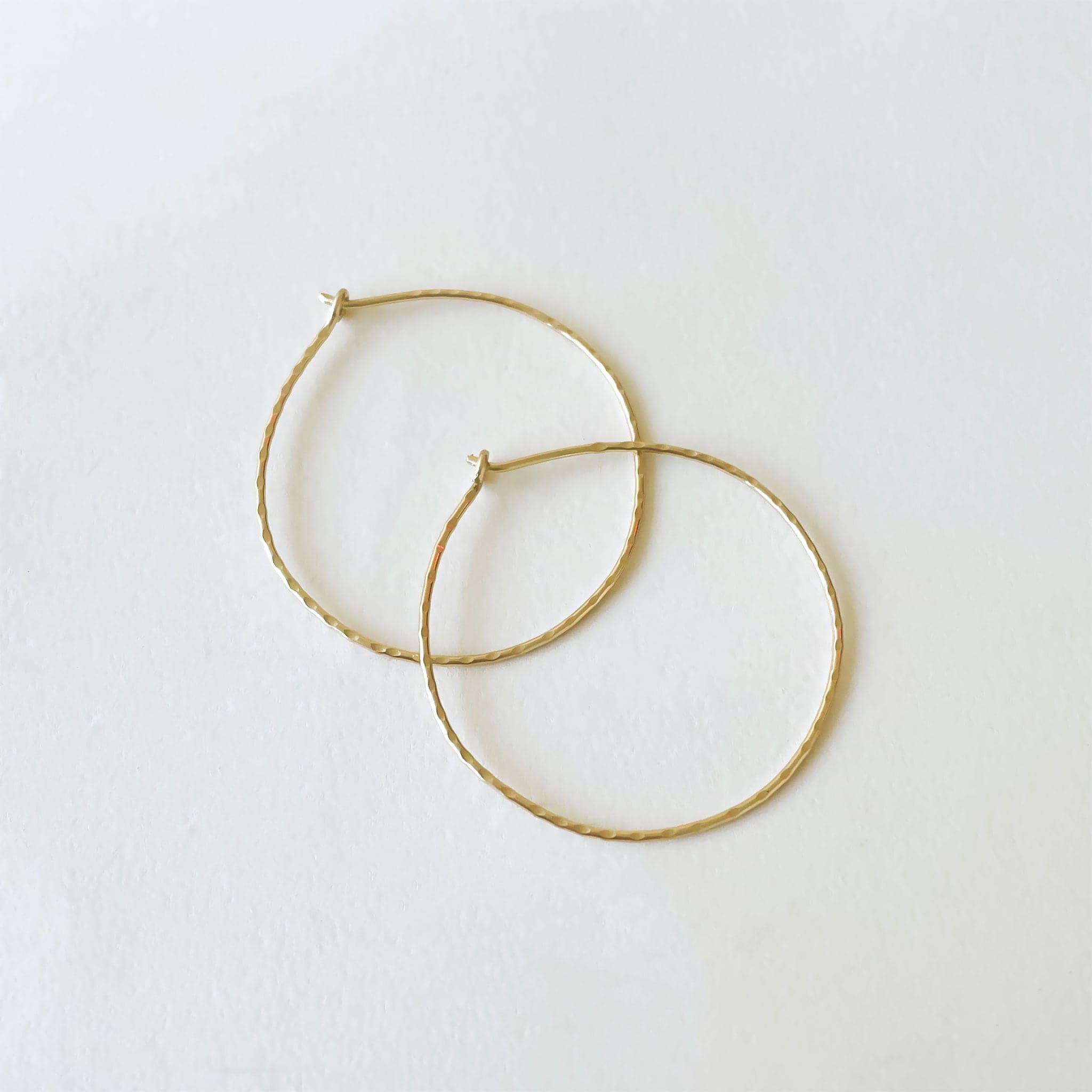 The largest option of hammered 14k hoops.