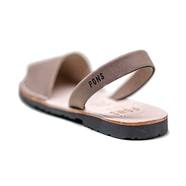Single Avarca sandal. The sandal&#39;s front strap is a taupe leather and large enough to cover the front half of foot. On the back half is a thin leather ankle strap that wraps on the back side. &#39;Pons&#39; is written in black text on the back strap.