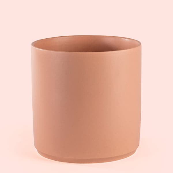 This 2 to 3 gallon ceramic pot has a classic cylinder shape and is a peachy color.