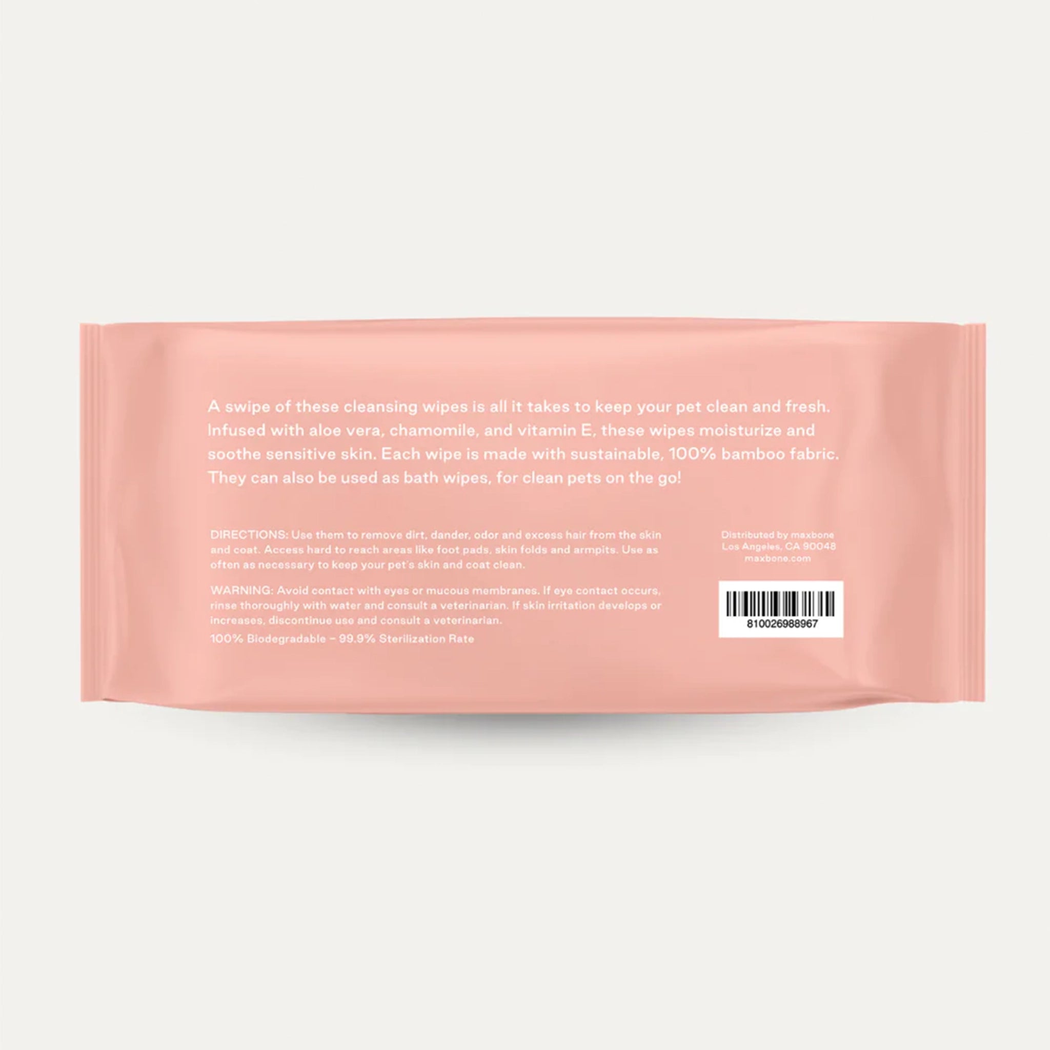 A pink bag of wet wipes with a resealable dispenser at the top along with words one the side that read, "Good for your dog. Good for the planet." in white text.