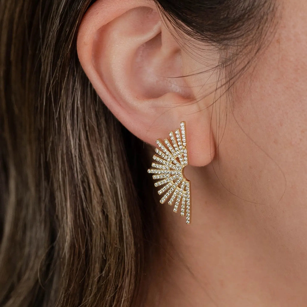 A gold vermeil sunburst earring. Each &#39;sun ray&#39; has cz stones lined on it.