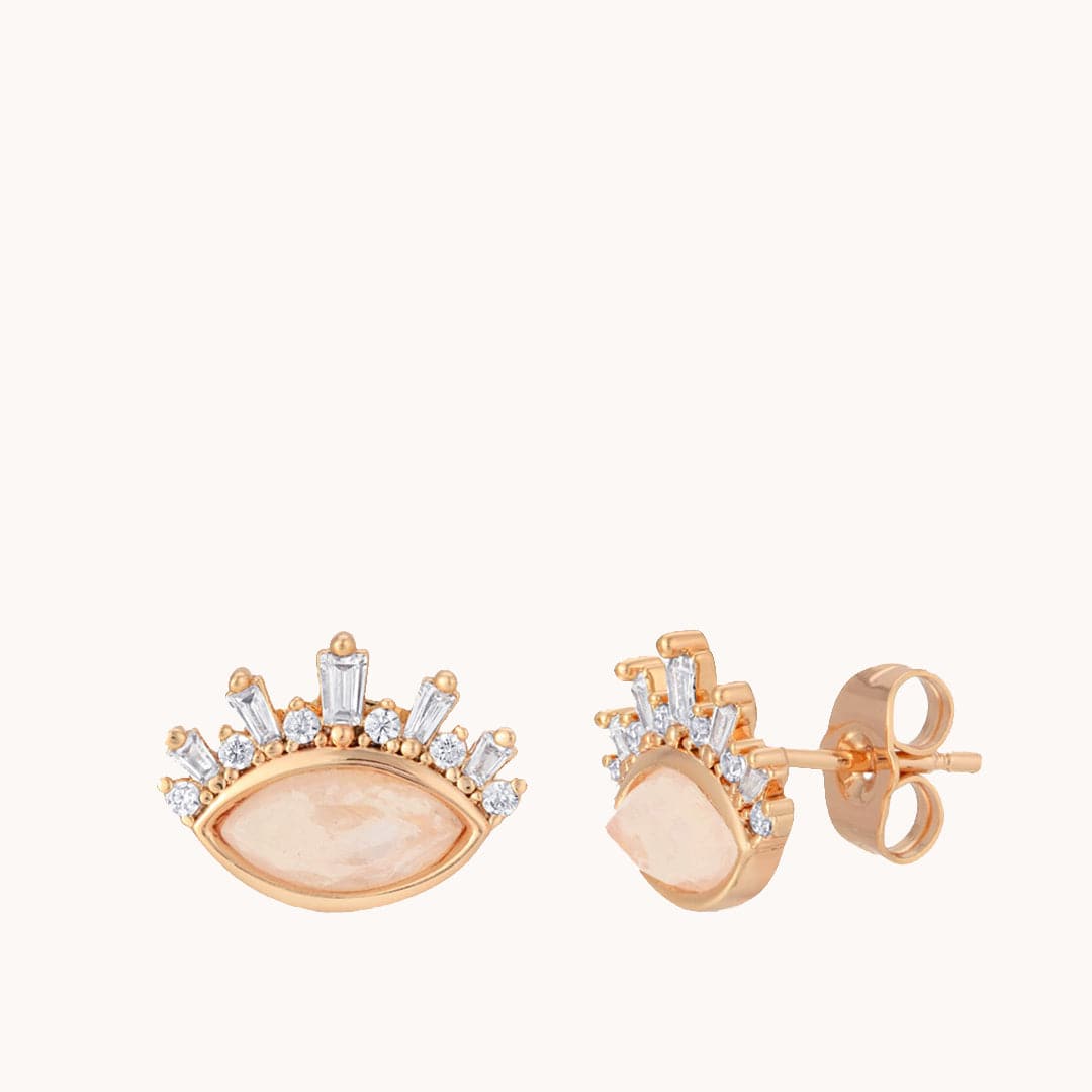 God stud earrings with set almond shape moonstone, with clear crystal gems along the top of the set moonstone.