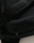 A black nylon fanny pack with two zipper pockets and a black adjustable strap.