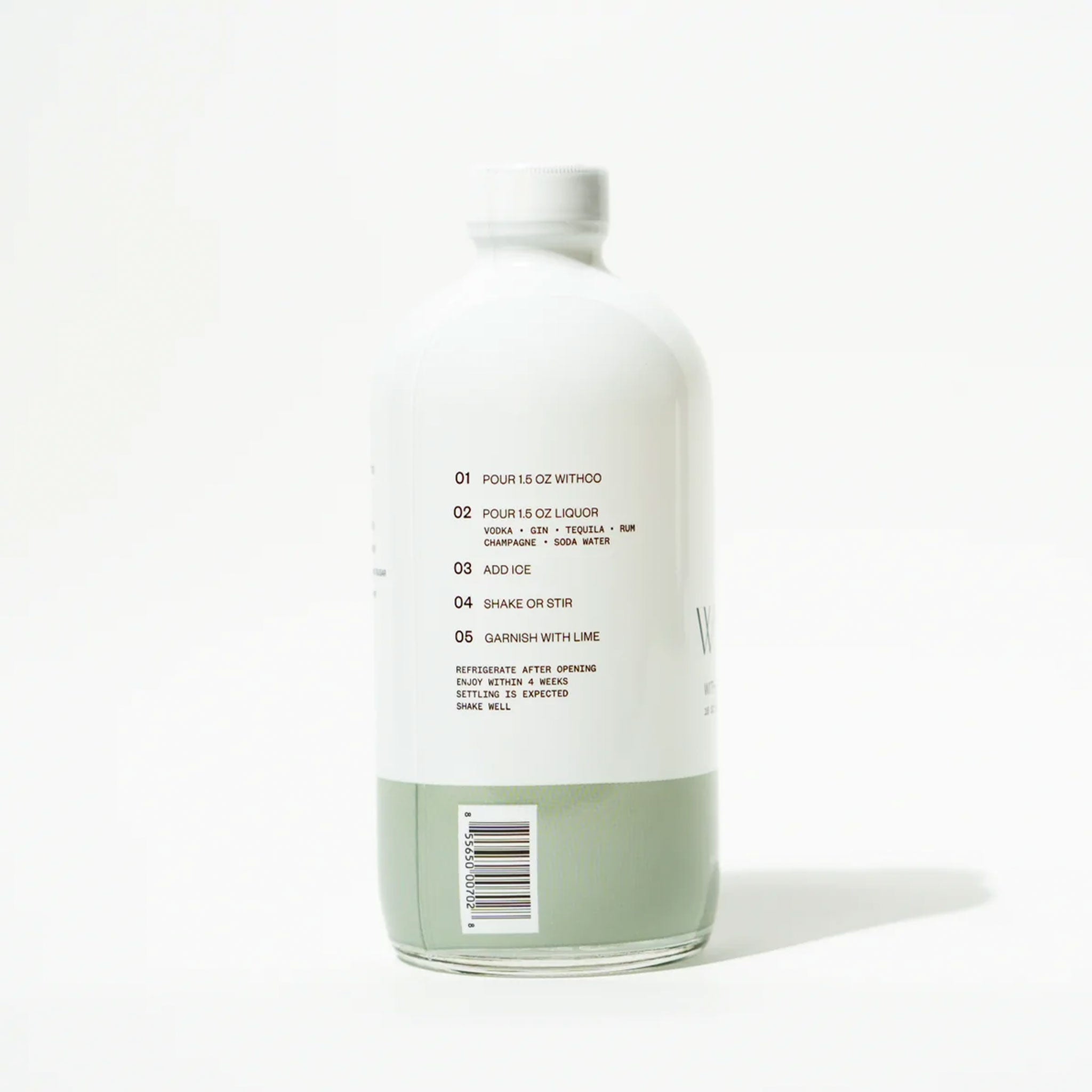 A white container with a sage green bottom half along with the brand &quot;With Co&quot; written in black text along with the name of the cocktail mix &quot;Hey Girl&quot; in white text on the green background.