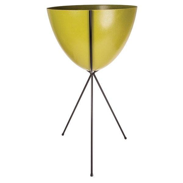 In front of a white background is an olive green colored bullet planter. The planter has a wide top and narrows at the bottom. The planter is held up by a black metal stand. The stand has three black metal legs.
