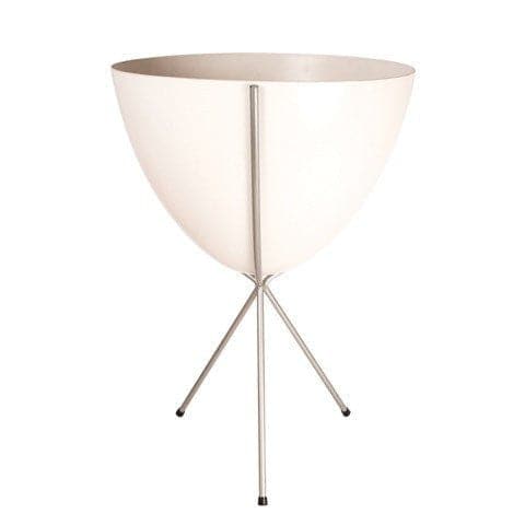 In front of white background is a white planter in a silver metal stand. The bullet planter is wide at the top and narrow at the bottom. The metal stand has three legs.