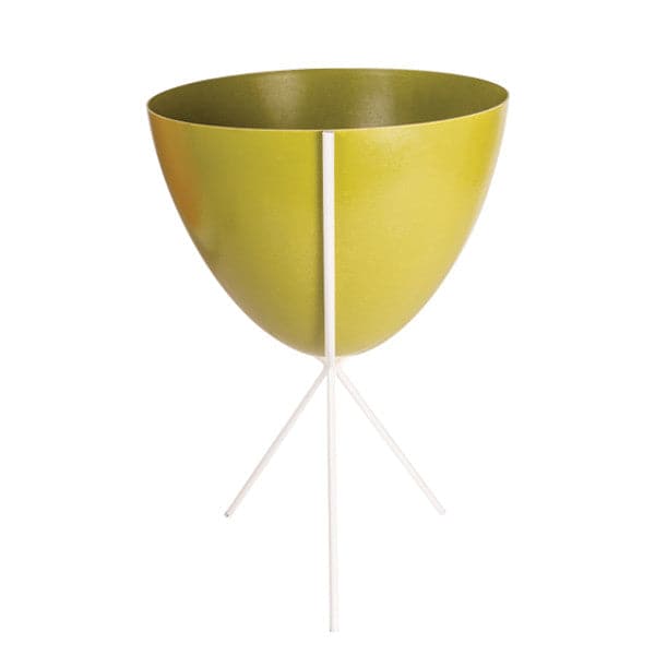 In front of white background is an olive green planter in a white metal stand. The bullet planter is wide at the top and narrow at the bottom. The metal stand has three legs. 