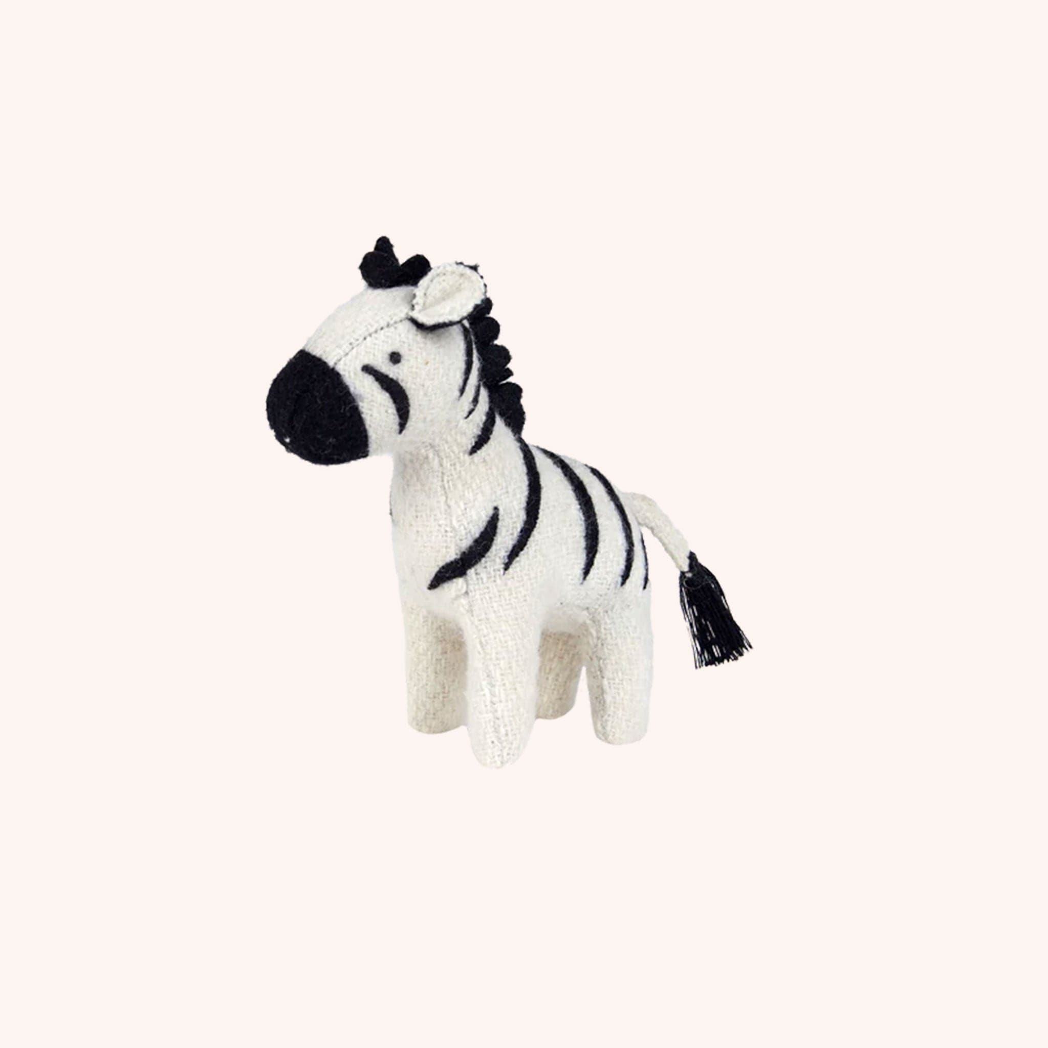 A purple elephant, a teal rhino and a black and white zebra stuffed animal set perfect for the little ones.