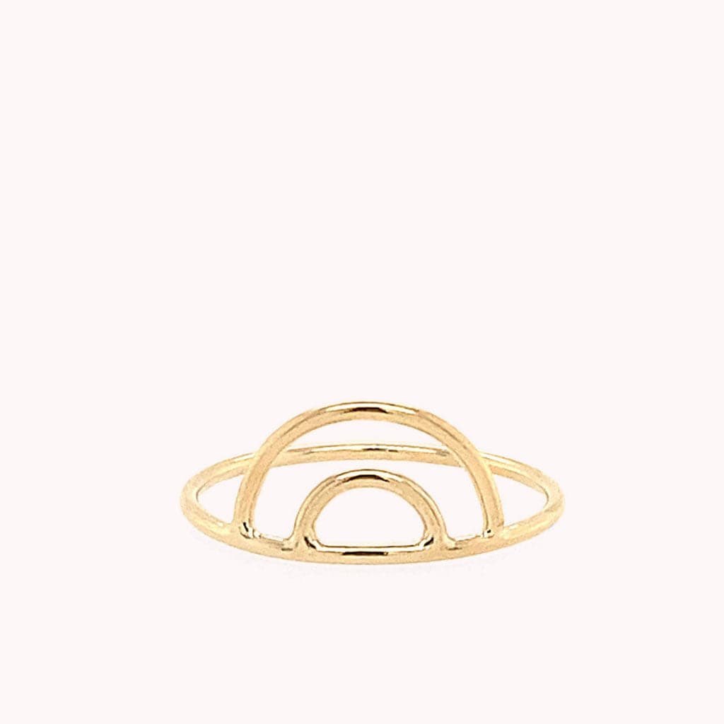 Gold rainbow ring with a thin wire band.