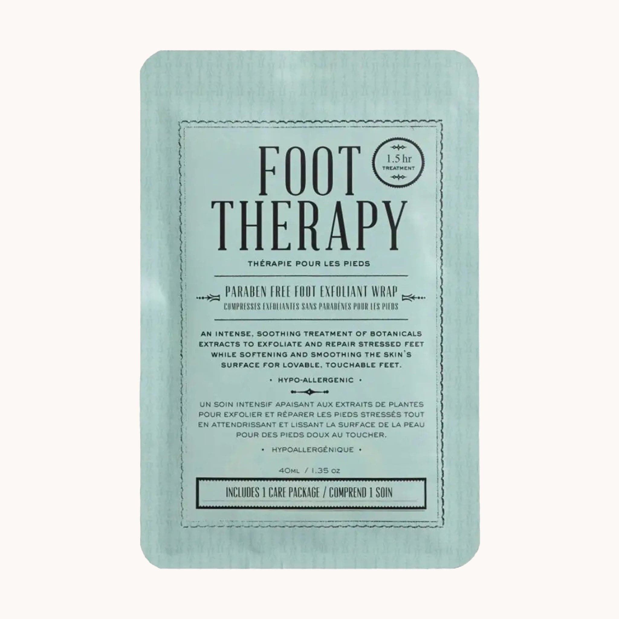 On a white background is a light blue packet with a foot mask inside along with text on the front that reads, "Foot Therapy".
