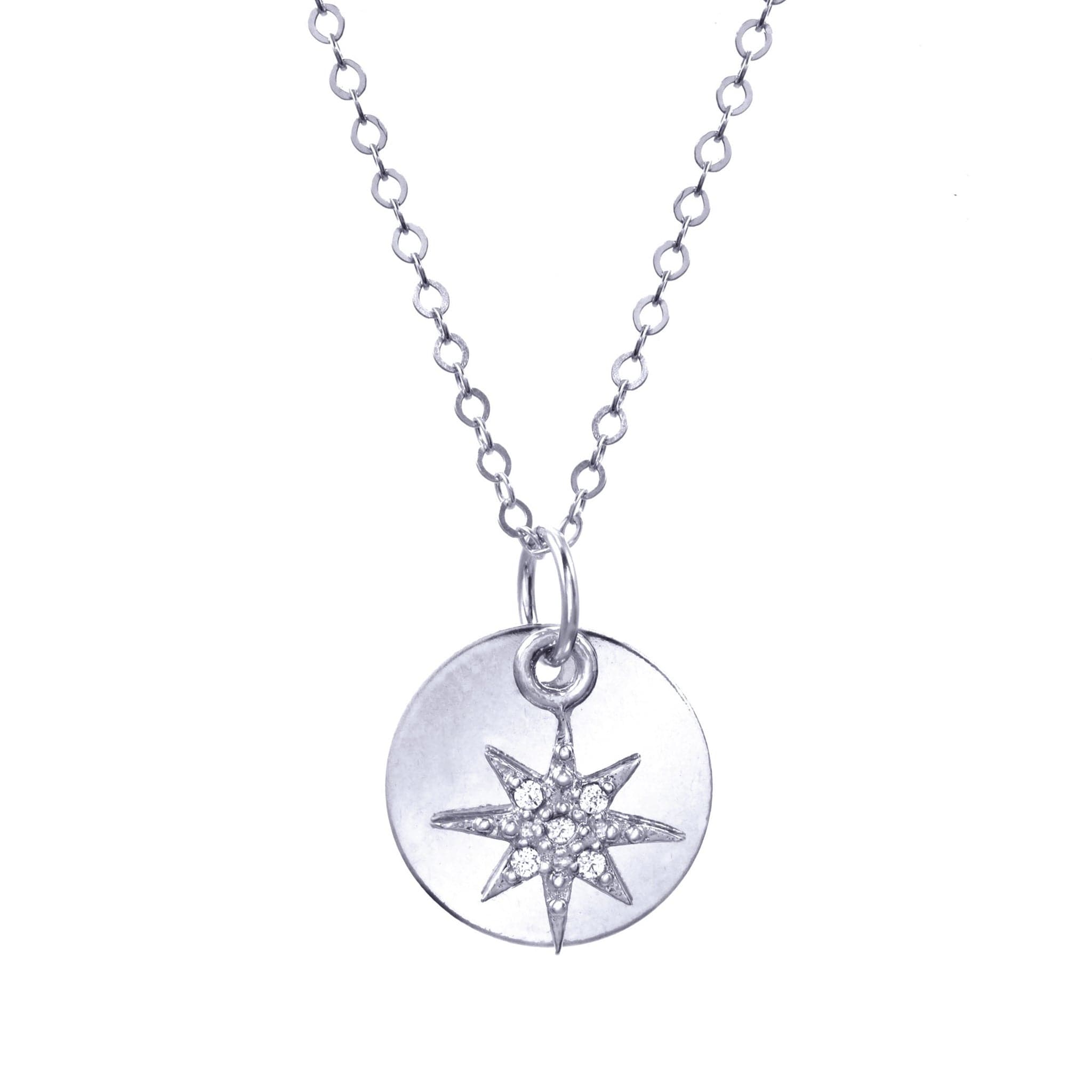 Long silver chain and circle silver pendant with crystal gemmed star charm.