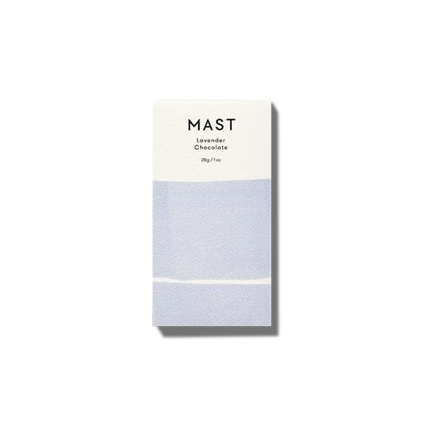 The smaller size of the chocolate bar with white and light purple packaging along with black letters at the top that read, &quot;Mast Lavender Chocolate&quot;.