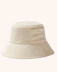 An ivory cotton bucket hat with a ribbed brim and a single side pocket.
