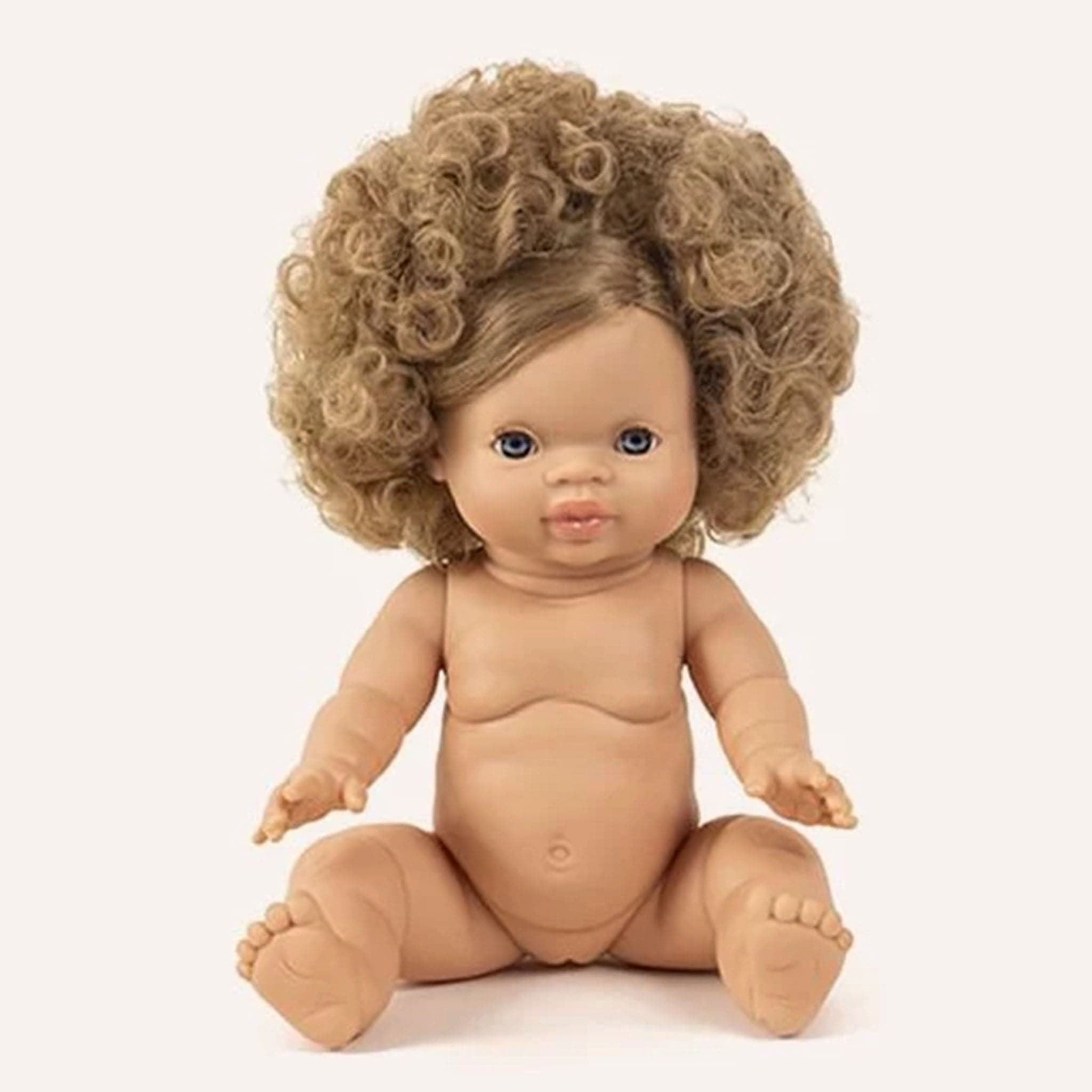 Naked baby doll sitting with caramel skin, ash blonde ringlet hair and dark grey eyes.