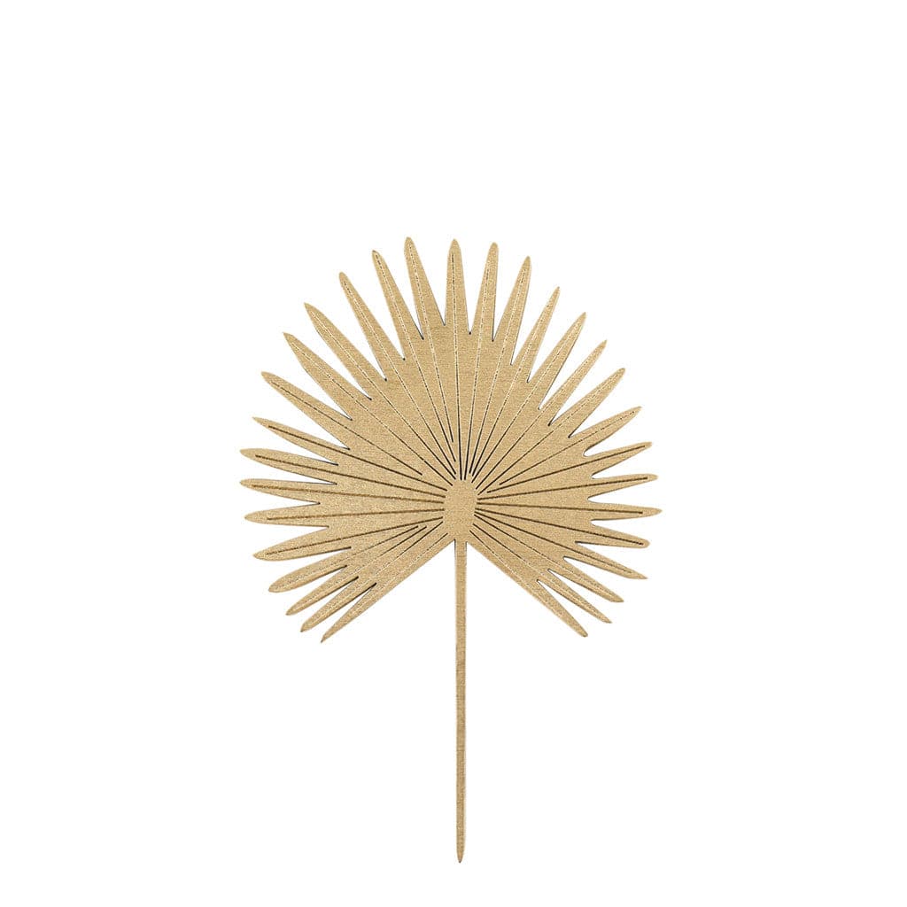 In front of a white background is a wood palm cut out. It has a long stem and a fan palm.
