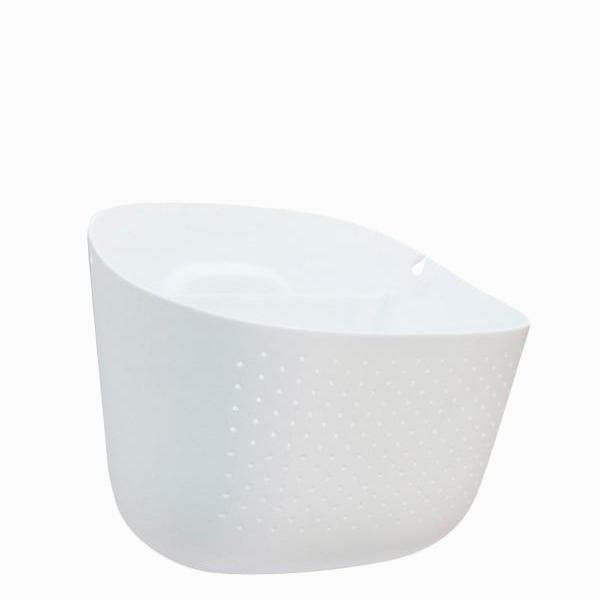 On a white background is a self watering wall planter with small holes in the front, an opening in the back for holding water and a photographed here showing the side view. 